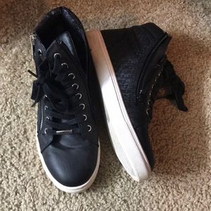 Black high top sneakers